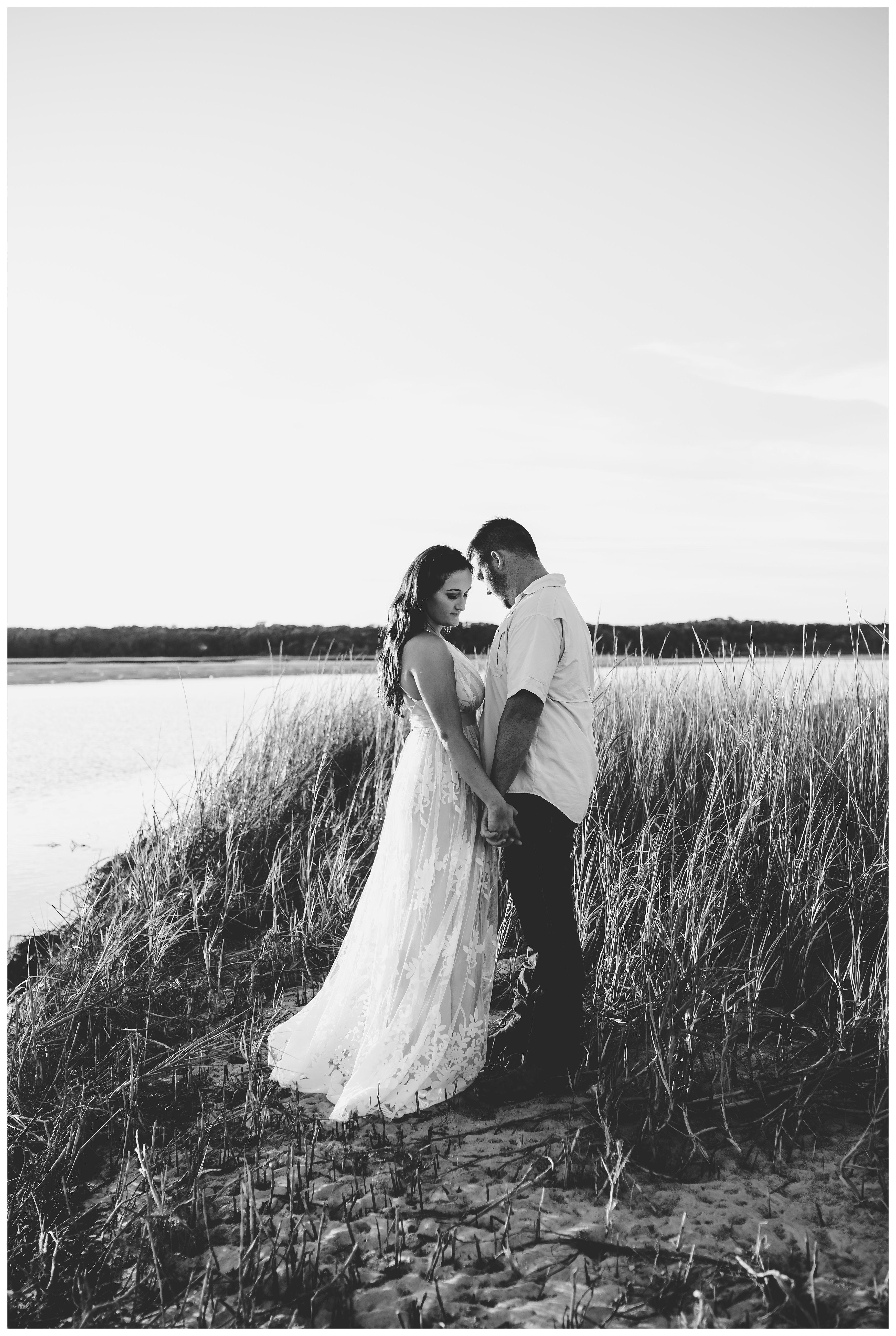 Natural intimate moment of engaged couple. Shelly Williams Photography