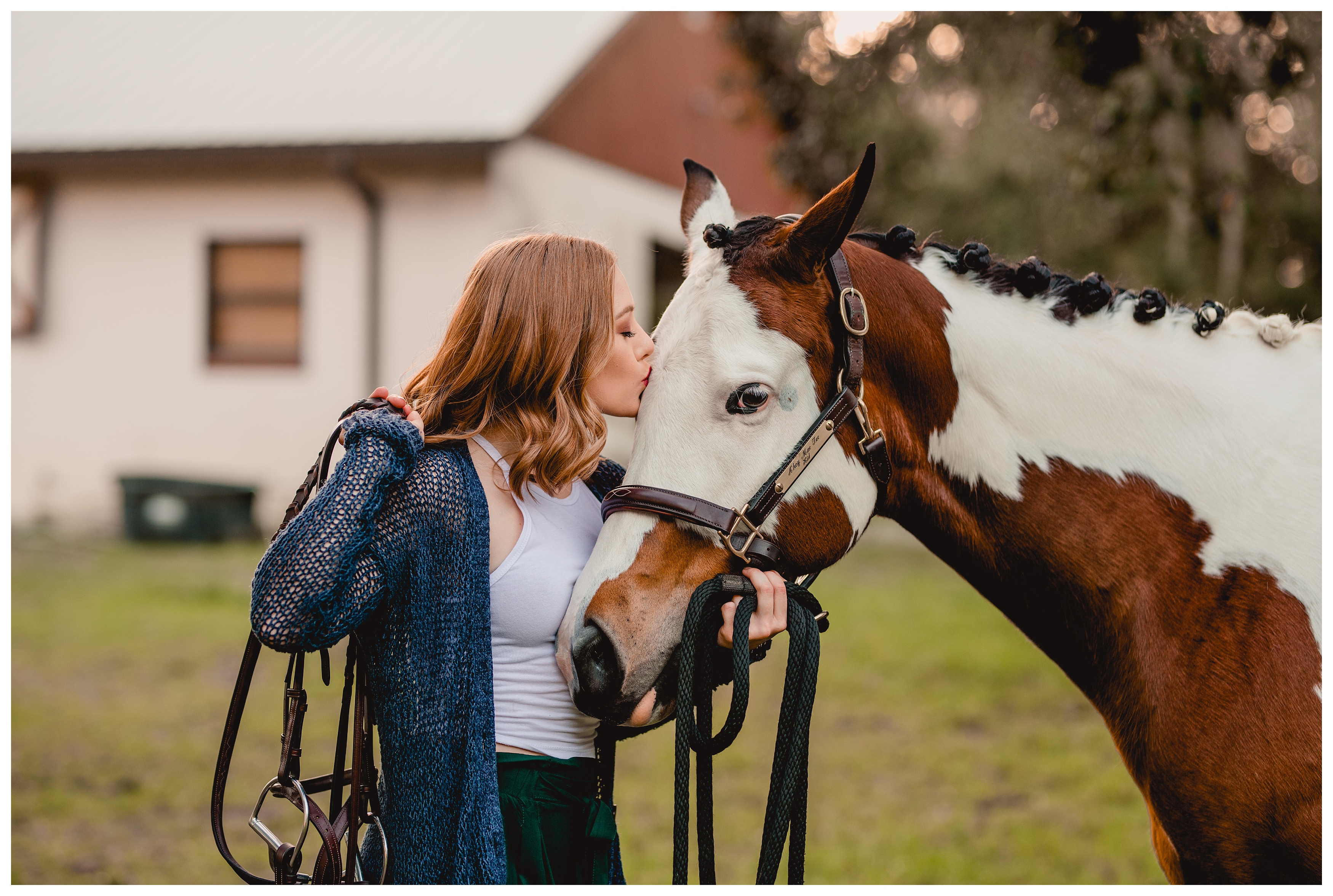 Lifestyle photographer takes pictures of girl with her horse, captures priceless moment of girl kissing her horse. Shelly Williams Photography