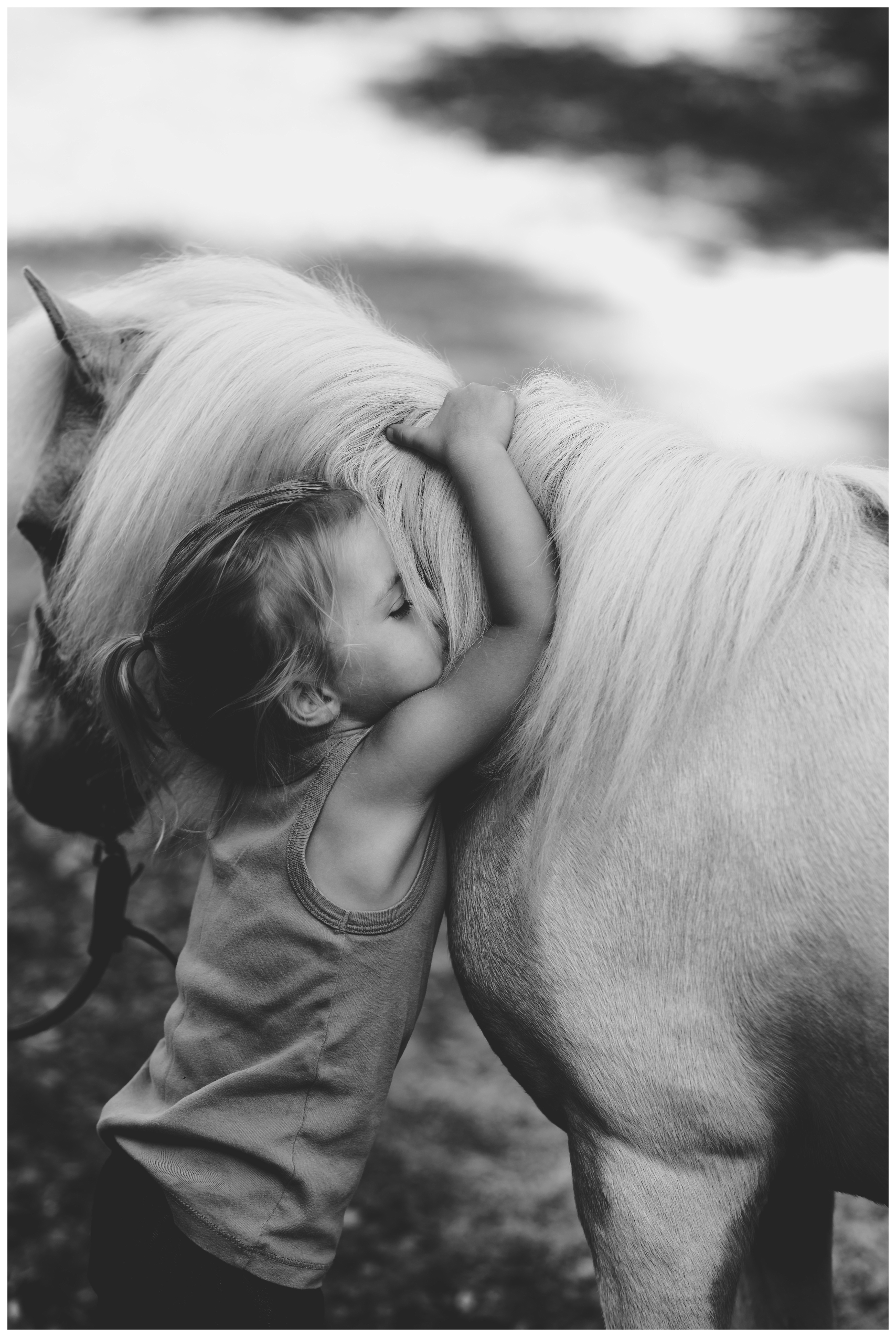Adorable photos of little girl with her miniature horse taken by horse photographer in Ocala, Florida. Shelly Williams Photography