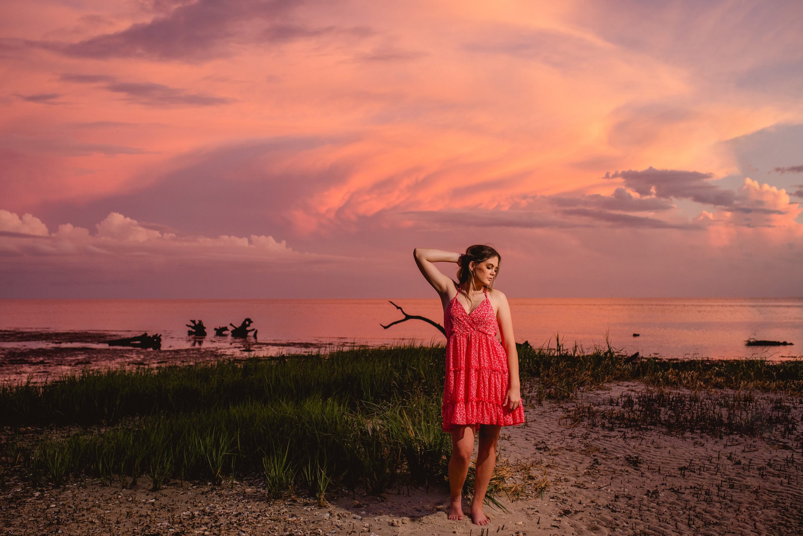 Beautiful sunset photo on the beach with high school senior in Florida.