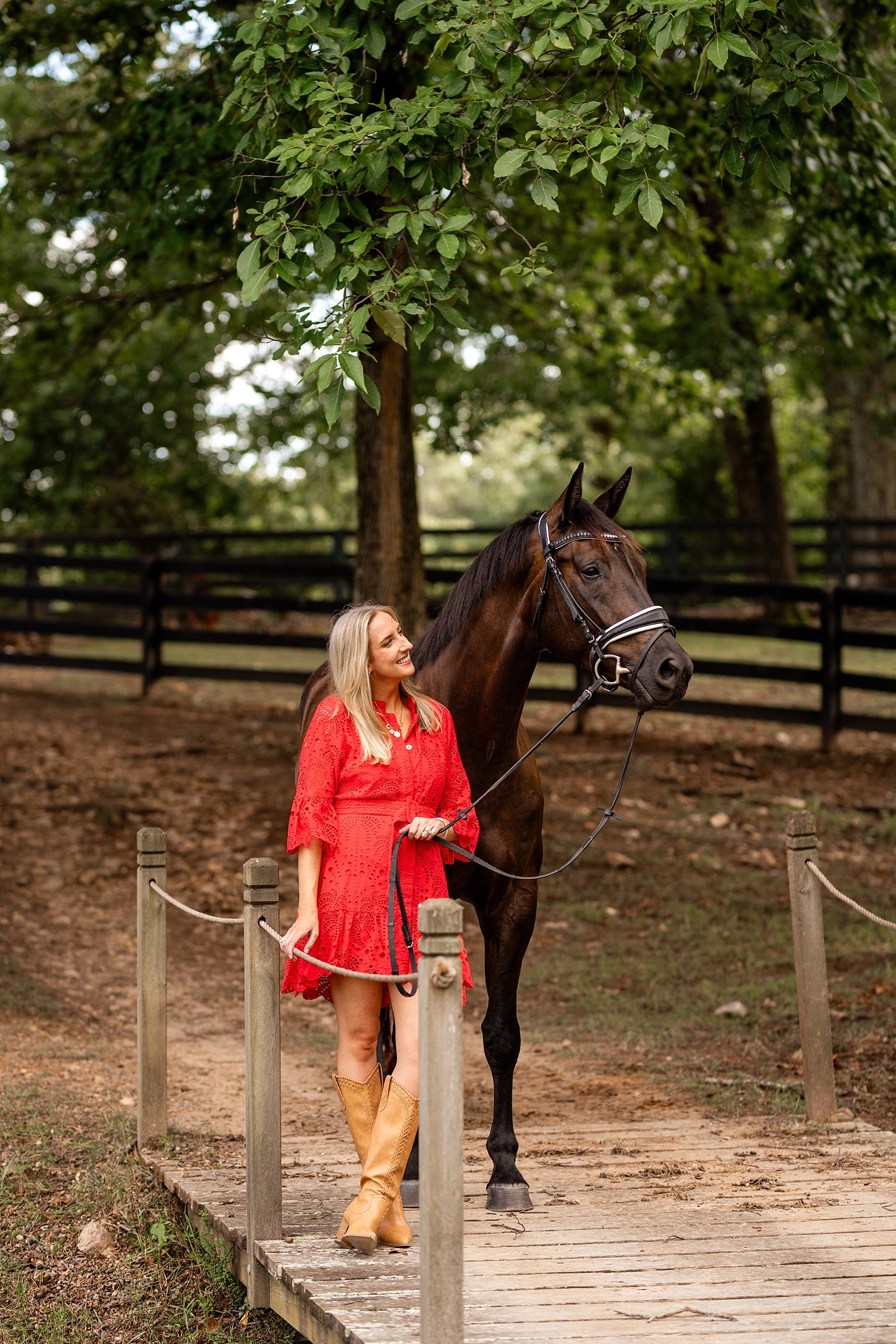 Girl in red dress takes photos with her horse in Atlanta, Georgia. Dressage Rider. Outfit ideas for horse and rider photoshoot. Atlanta equine photographer.
