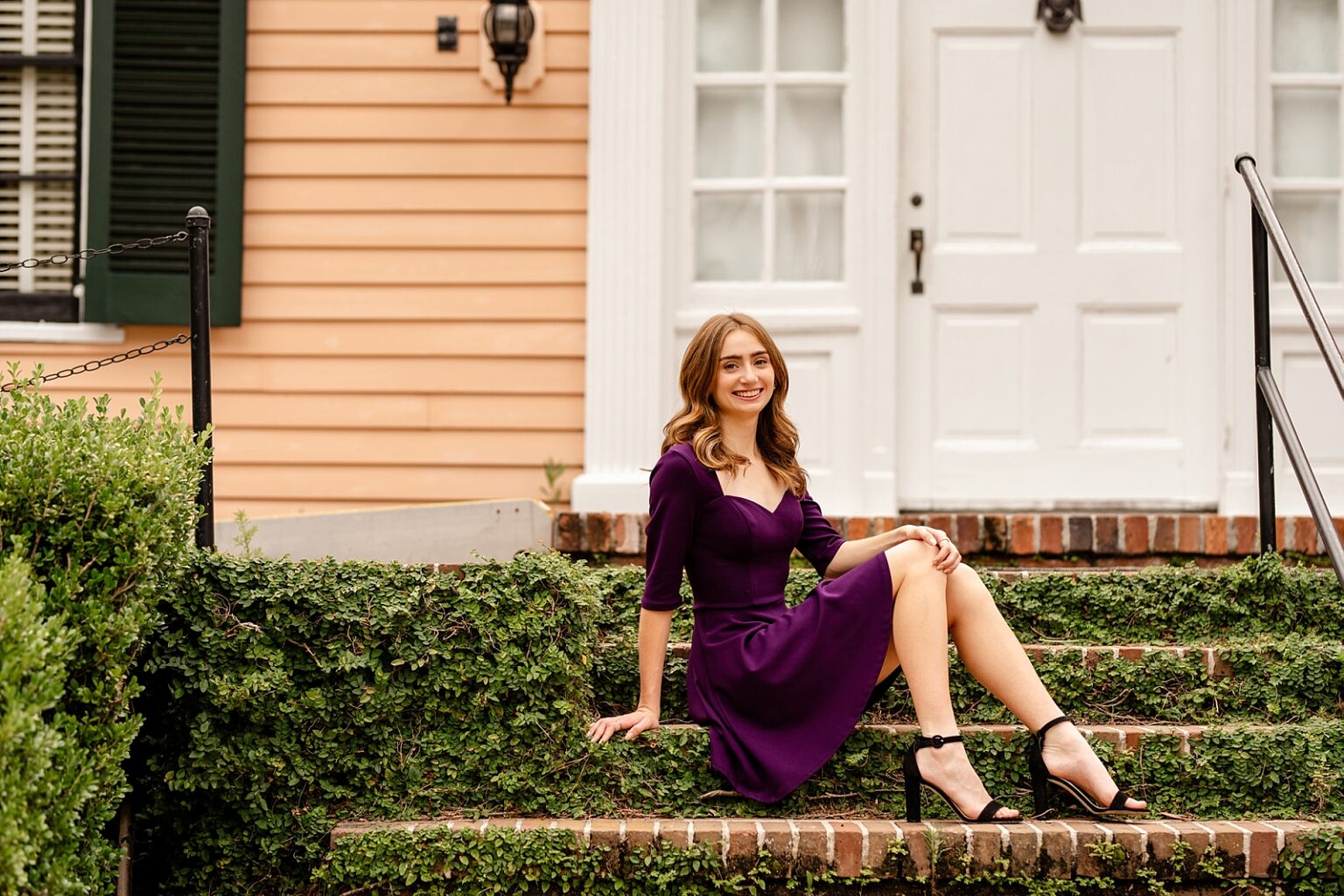 Tallahassee senior photographer takes pictures at Alfred Maclay Gardens in purple dress.