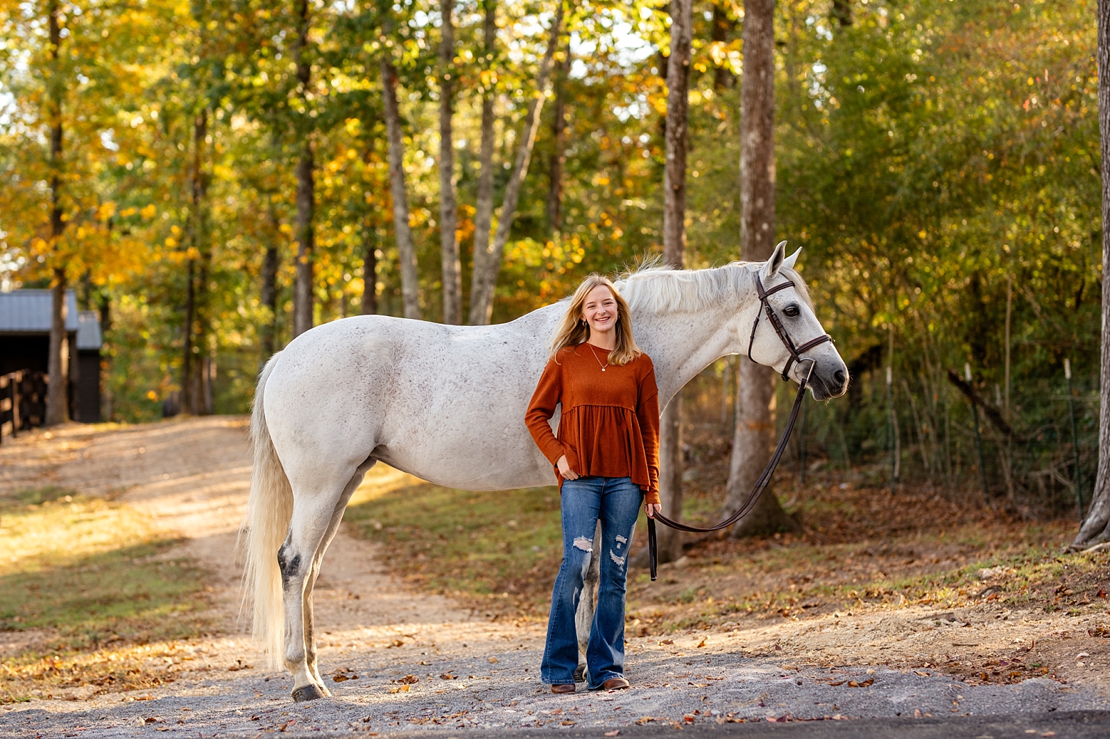 North Alabama horse photographer. Photos of horses in the fall. Equestrian. High school senior with her horse.