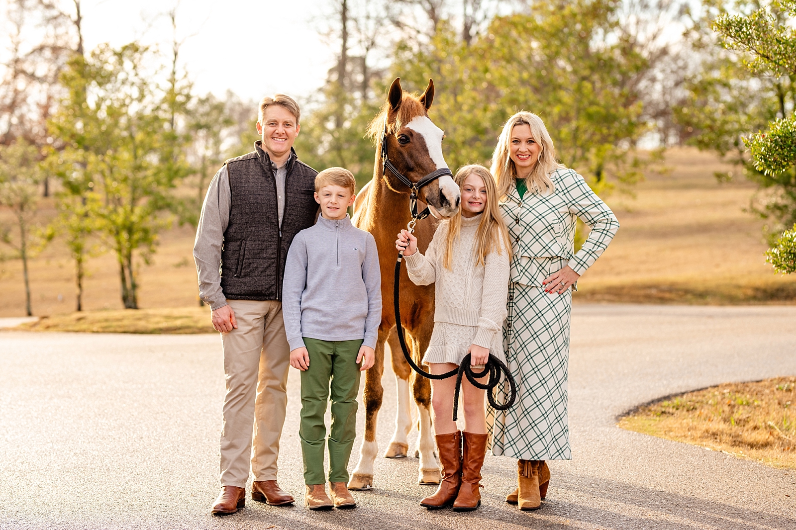 Equestrian family photography. Family photos with horses. Girl and her pony. Winter equine photoshoot.