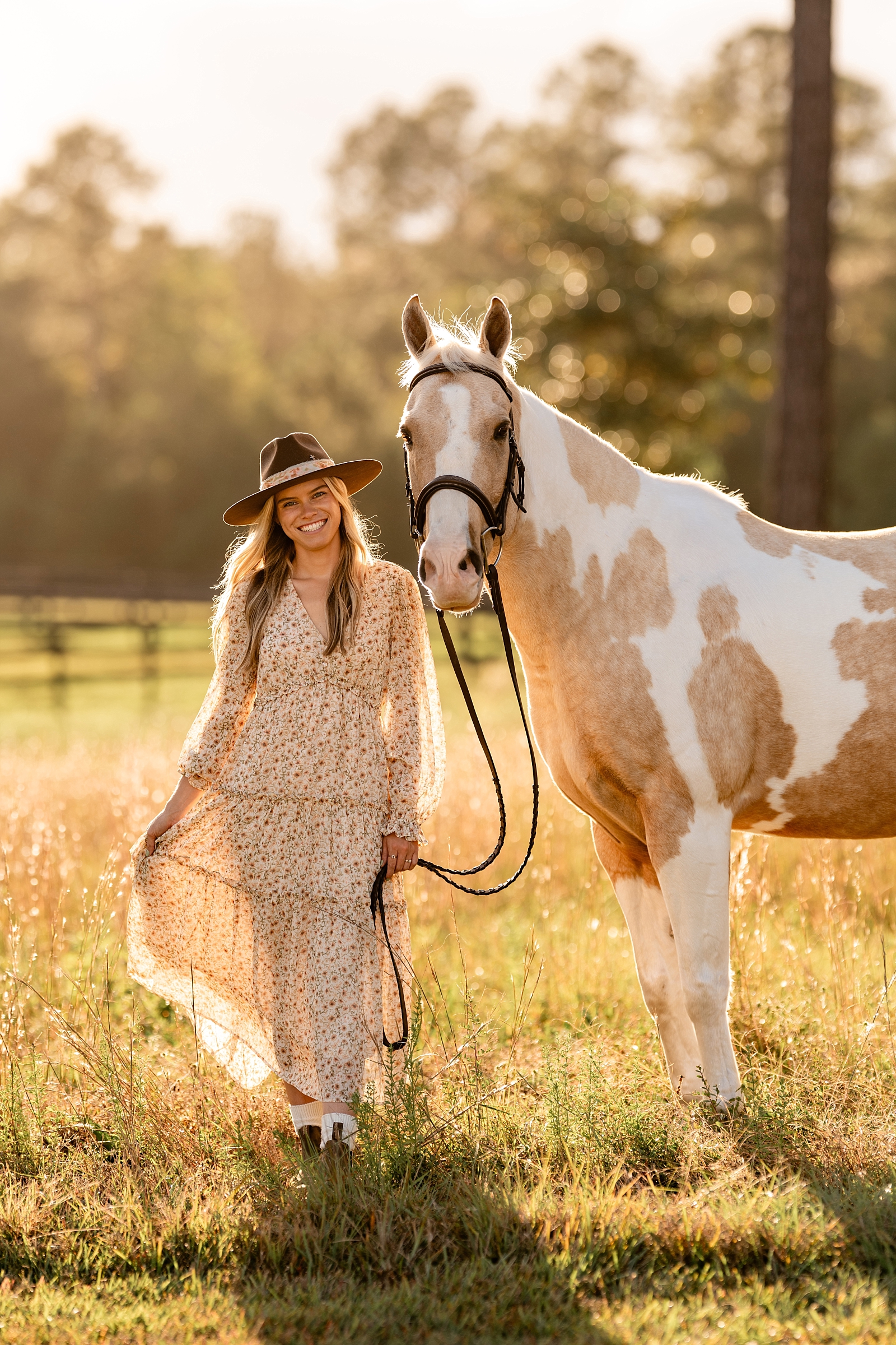 Courtney with her palomino paint pony, Link, captured during a golden hour horse photography session in Pensacola.